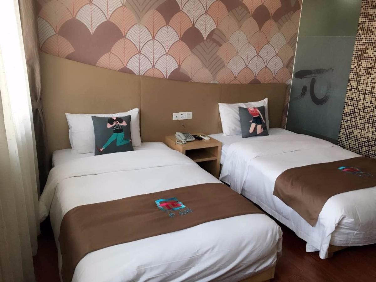 Pai Hotel Chongqing Qijiang Bus Station Екстер'єр фото